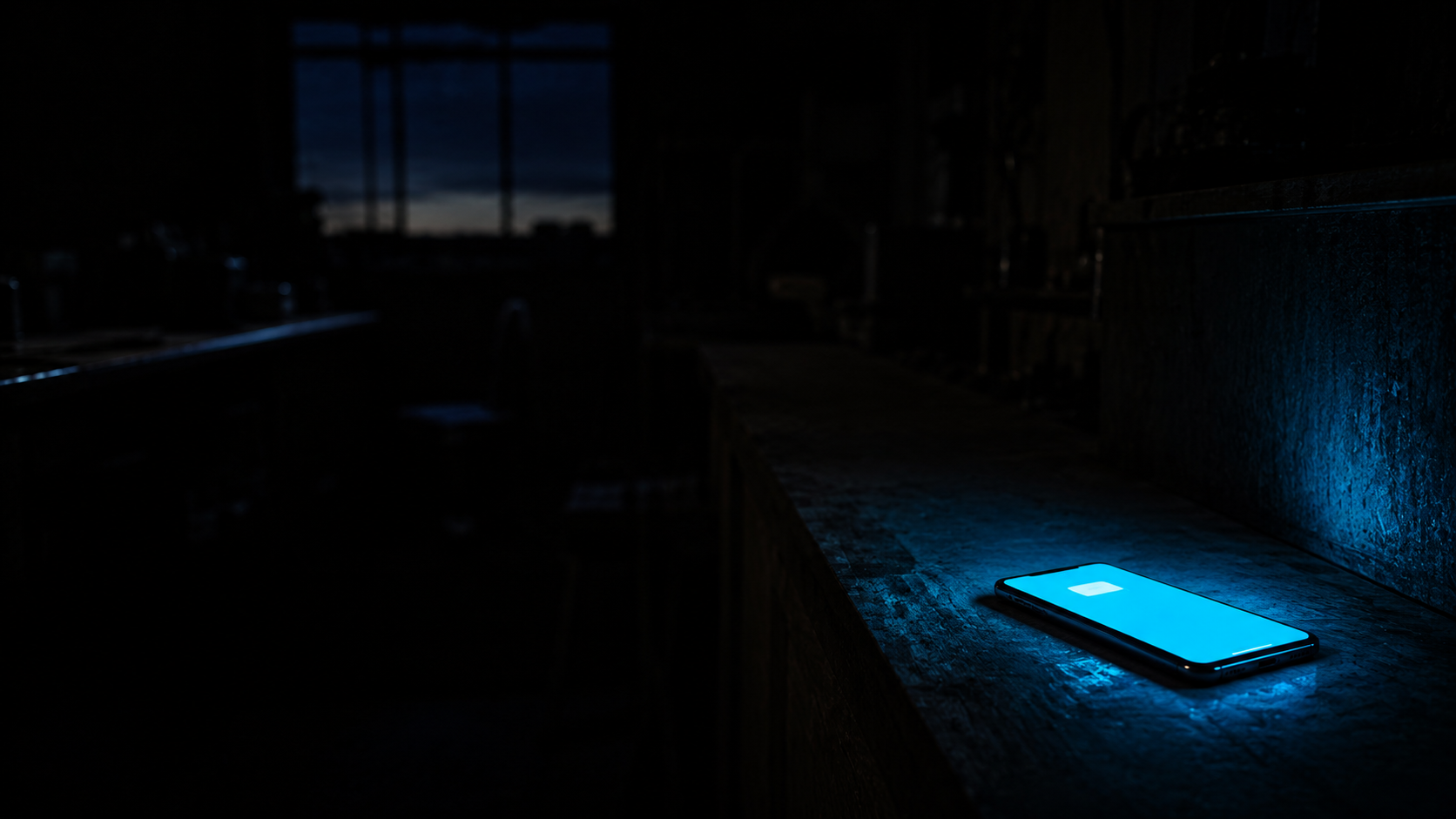 Empty Australian small business workspace at 3am, a single phone glowing cyan on a counter — the salesperson working while everyone sleeps